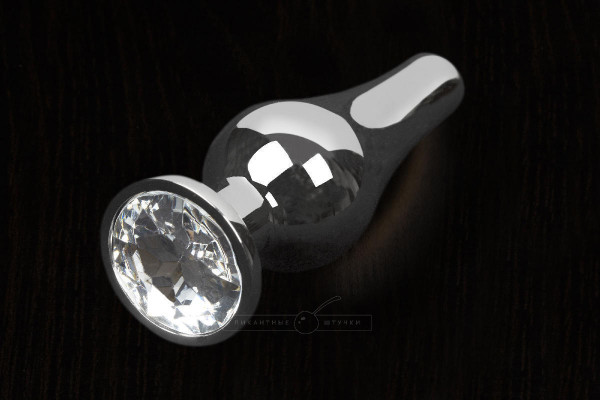 Анальная пробка маленькая Пикантные Штучки с бесцветным кристаллом, серебристая, 8.5 см